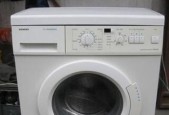 洗衣机散发糊味的原因及解决方法（洗衣机臭味是如何产生的）