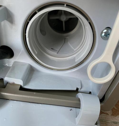 洗衣机出水口短了怎么处理（解决洗衣机出水口缺陷的有效方法）  第3张
