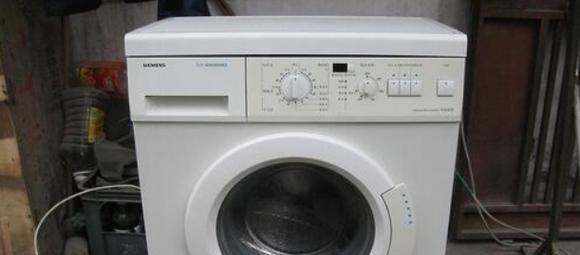 洗衣机散发糊味的原因及解决方法（洗衣机臭味是如何产生的）  第1张
