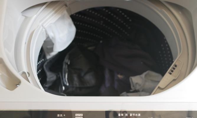 松下滚筒洗衣机故障显示E12原因解析（排水故障导致松下滚筒洗衣机显示E12错误代码）  第1张